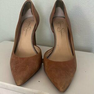 Jessica Simpson tan leather pumps. Has scrapes wear and tear from use.